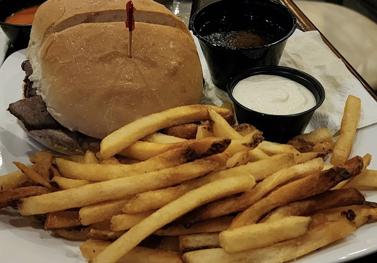 The Dark Horse Tavern signature dishes Tavern BurgerPoutineCrispy Chicken Sandwich